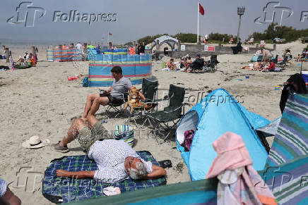 People enjoy the beach in West Wittering