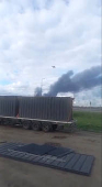 A drone lifts off from wooden sheds loaded onto a truck that was driven to the perimeter of an air base in Mal'ta