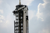 A Falcon 9 rocket stands at the pad before its upcoming launch of the Axiom-4 crewed mission to the International Space Station