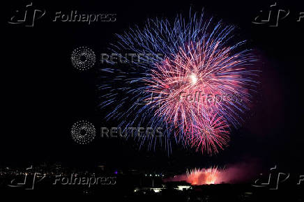 Fireworks explode near the Washington Monument during a Fourth of July celebration at the White House in Washington
