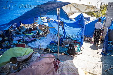 Migrants camp outside Paris City Hall asking for shelter
