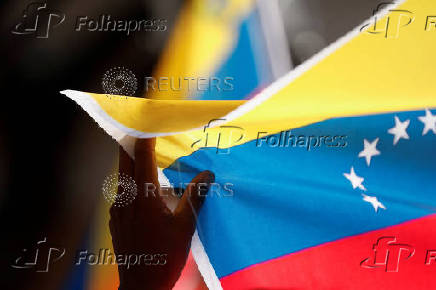 People participate in a march in support of Venezuelan President Nicolas Maduro, in Caracas