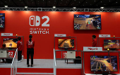 An attendee plays with the Nintendo Switch 2 gaming device at a media event in Tokyo