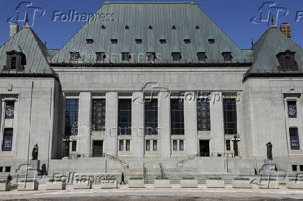 A pedestrian walks outside the Supreme Court of Canada in Ottawa