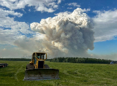 FILE PHOTO: Smoke rises from the Hubert Lake wildfire WWF023, which forced the evacuation of the Hubert Lake Provincial Park area