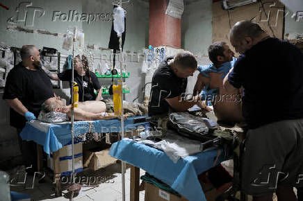 Ukrainian Armed Forces combat medics treat injured servicemen near Chasiv Yar
