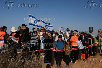 Israeli right wing activists take part in a rally organized by settlers groups to promote Israel's resettling in Gaza