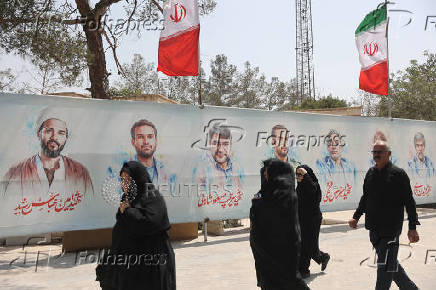FILE PHOTO: Pictures of Iranian military commanders, nuclear scientists and others killed in Israeli strikes are displayed in Behesht Zahra Cemetery in southern Tehran