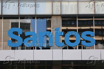 A Santos logo is visible outside their headquarters in Adelaide