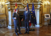 French Foreign Minister Jean-Noel Barrot receives Chinese Foreign Minister Wang Yi