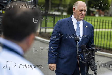 White House border czar Tom Homan talks with news media outside the White House