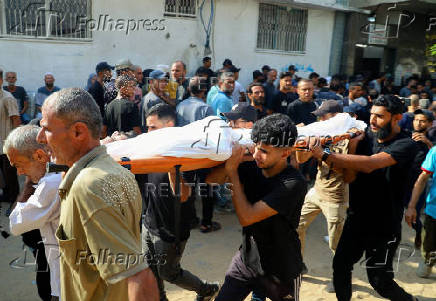 Funeral of Palestinians killed in Israeli fire while seeking aid on Wednesday, in Gaza City