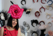 Milliner Merve Bayindir wears one of her hat creations as she speaks to Reuters ahead of the Ascot horse racing festival, in London