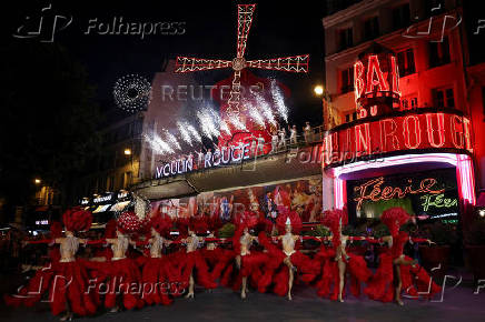The Moulin Rouge sails turn again in Paris