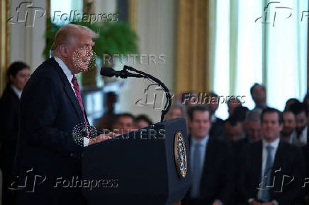 U.S. President Trump participates in a signing ceremony for the 