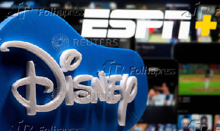 FILE PHOTO: Photo illustration of a 3D printed Disney logo seen in front of the ESPN+ logo