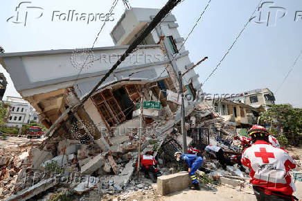 Chinese rescue personnel work following the earthquake, in Myanmar