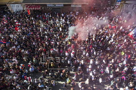 Players of Bologna FC and fans celebrate in Bologna