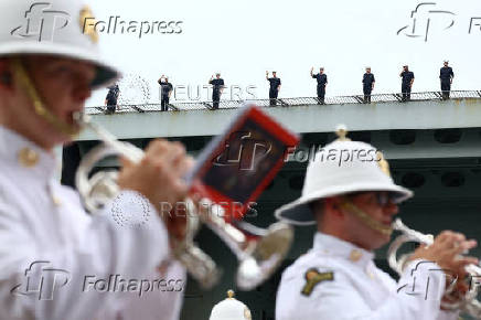 Britain's HMS Prince of Wales aircraft carrier arrives at Marina Bay Cruise Centre in Singapore