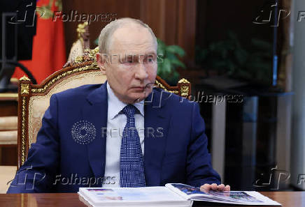 Russian President Vladimir Putin chairs a meeting on education in Moscow