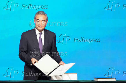 Chinese Foreign Minister Wang Yi attends the signing ceremony of the Convention on the Establishment of The International Organization for Mediation (IOMed) in Hong Kong