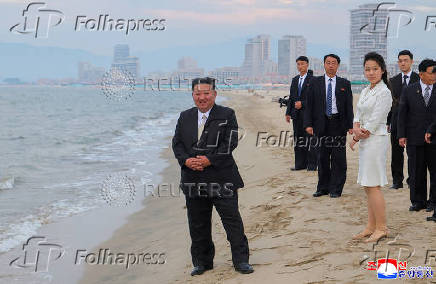 North Korean leader Kim Jong Un and his daughter Kim Ju Ae attend a ceremony to celebrate the completion of the Wonsan Kalma Coastal Tourist Zone