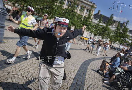 Newly graduated students celebrate end of high school in the streets of Copenhagen