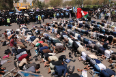 University students and professors perform prayers to ask for rain in Sanaa