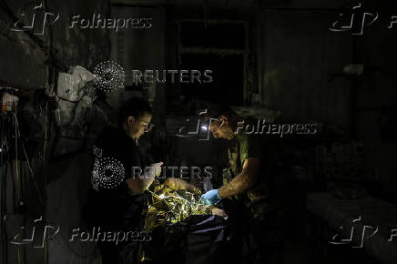 Ukrainian Armed Forces combat medics treat injured servicemen near Chasiv Yar