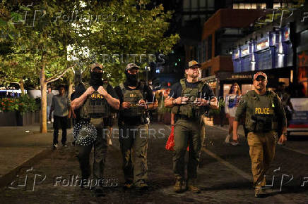 U.S. President Trump deploys the National Guard and federalizes the Metropolitan Police Department, in Washington