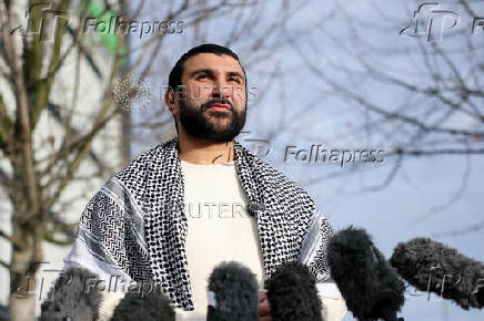 Pro-Palestinian commentator Sami Hamdi arrives in London after U.S. detention