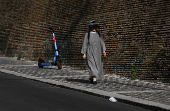 A nun walks near the Vatican after the election of Pope Leo XIV, in Rome