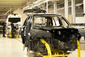 Technicians work on the assembly line for Rolls-Royce Cullinan and Ghost vehicles at Rolls-Royce Motor Cars' manufacturing plant in Goodwood