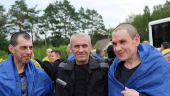 Ukrainian POWs react after a swap at an unknown location in Ukraine