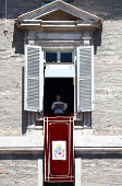 Pope Leo XIV leads the Regina Caeli prayer from his window in St. Peter's Square, at the Vatican
