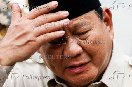 Indonesian President Prabowo Subianto speaks at the military airbase Halim Perdanakusuma in Jakarta