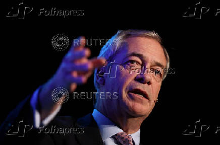 FILE PHOTO: Farage, leader of Britain's Reform UK party speaks at regional conference in Trowbridge