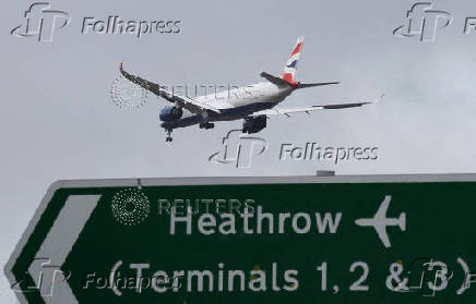 FILE PHOTO: Planes make landing approach to Heathrow Airport in west London
