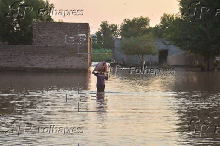 Thousands are evacuated as floods devastate parts of Punjab province
