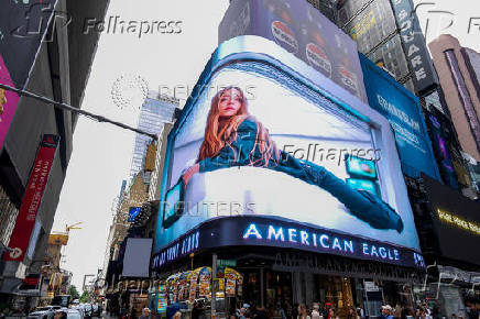 FILE PHOTO: An electronic billboard displays an American Eagle ad campaign featuring Sydney Sweeney, in New York City