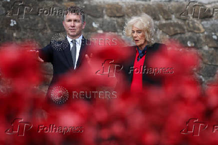 Britain's Queen Camilla views an installation of 30,000 ceramic poppies commemorating the 80th anniversary of Victory in Europe (VE) Day in London