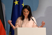 Outgoing German Foreign Minister Baerbock welcomes her successor, newly appointed German Foreign Minister Wadephul prior a handover ceremony in Berlin