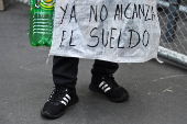 Evo Morales supporters march in mourning amid economic crisis, in La Paz