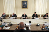 Russian President Vladimir Putin meets with heads of international news agencies in Saint Petersburg