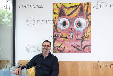 Palestinian-British chef Tamimi sits for portrait during interview with Reuters at his home in London