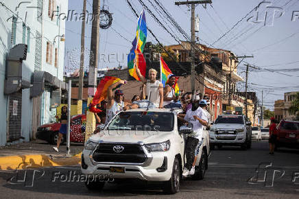 People attend the annual Pride Parade in Santo Domingo