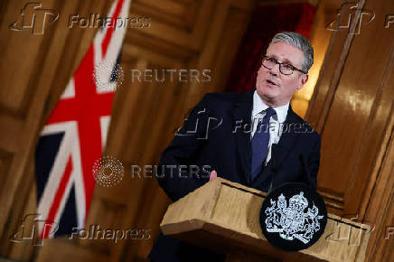 Britain's PM Starmer delivers statement inside No. 10 Downing Street, in London