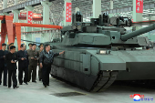 North Korea's leader Kim tours military equipment facility
