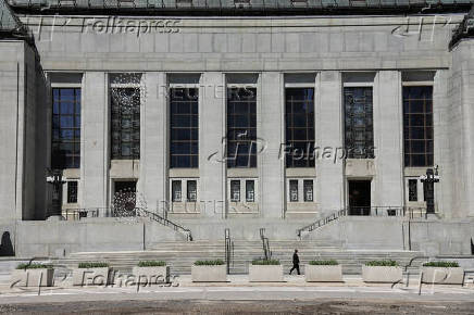 A pedestrian walks outside the Supreme Court of Canada in Ottawa