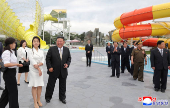 North Korean leader Kim Jong Un and his daughter Kim Ju Ae attend a ceremony to celebrate the completion of the Wonsan Kalma Coastal Tourist Zone